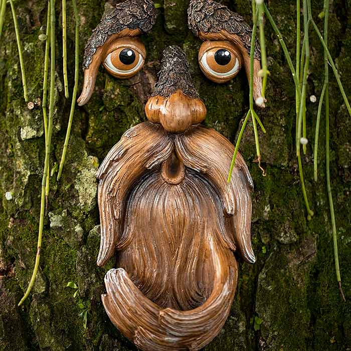 BirdFeeder, a tree decoration in the shape of a face that is also a bird feeder - Image 3