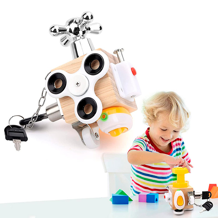 Didactic toy with 7 different activities - spinner, lock with 2 keys, latch, wheel, switch, thread and nut!