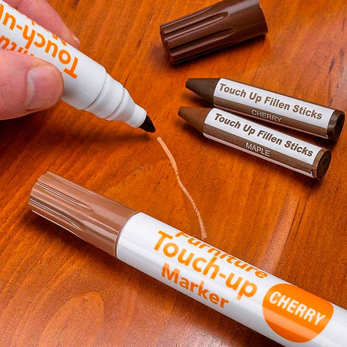 8 markers for repairing minor scuffs and 8 wax sticks for filling in deeper scratches!