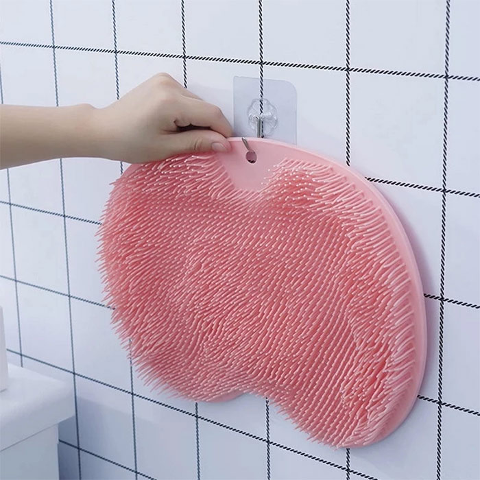 Treat your feet to a relaxing massage in a warm shower!