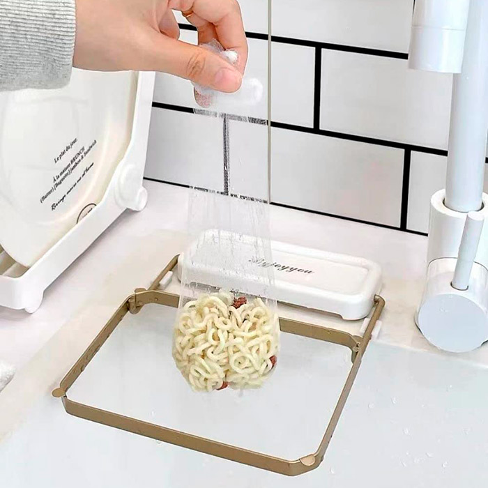 WasteStrainer, a holder with a mesh to be placed on the kitchen sink - Image 5